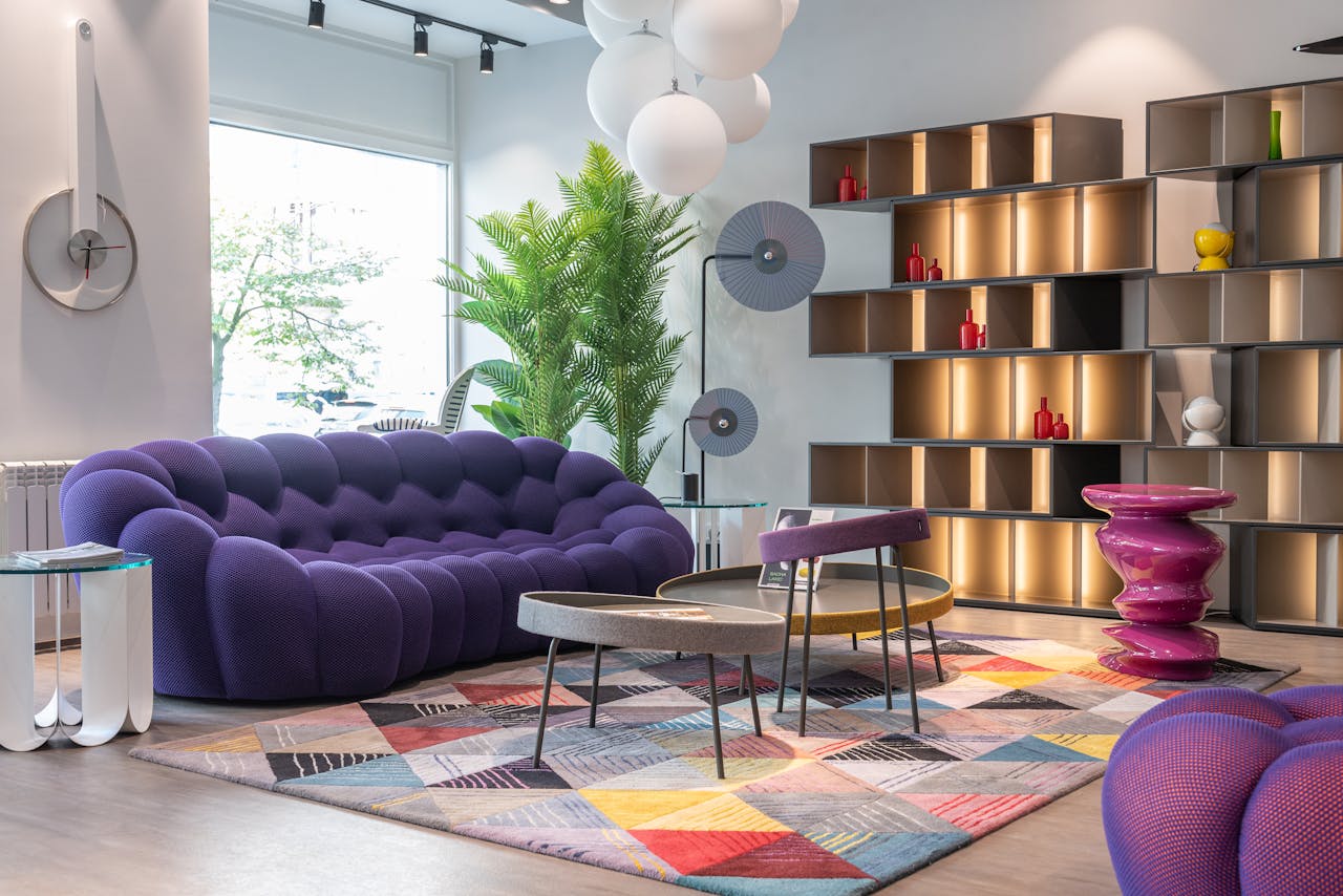 services-06 Explore a modern living room with vibrant colors, chic furniture, and elegant decor.